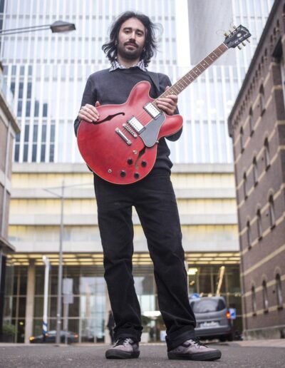 Yiannis Mitsios teaches guitar at the music school in Rotterdam.